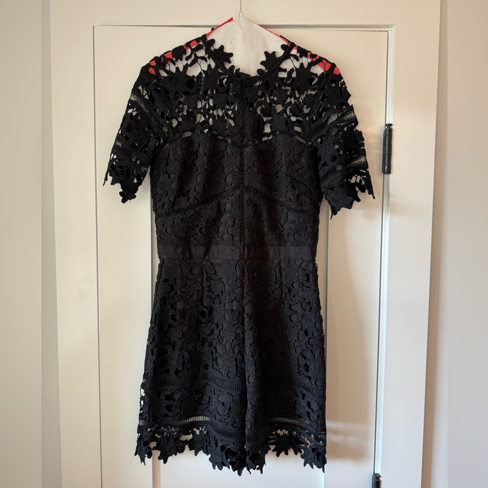 ADELYN RAE black lace work romper, high neck. size S